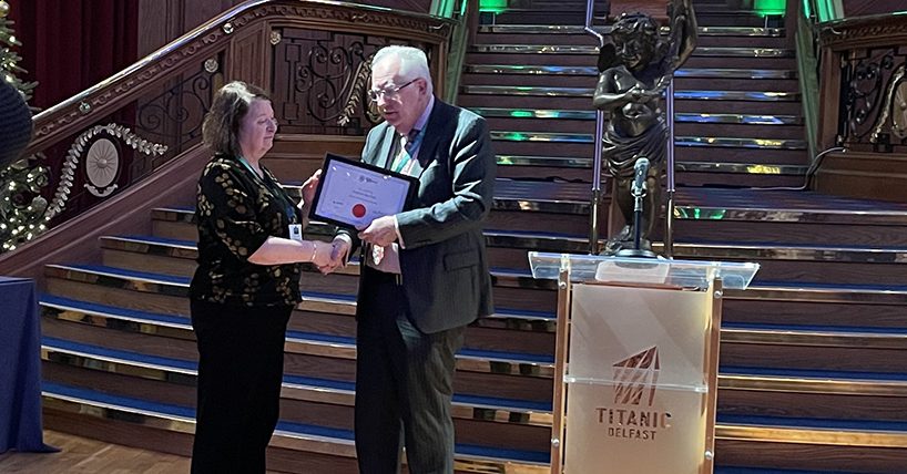 Prof Ann Daly receiving a certificate from BPS President